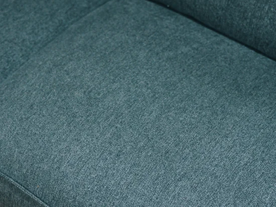 Gros plan sur le revêtement en tissu gris foncé du canapé convertible White